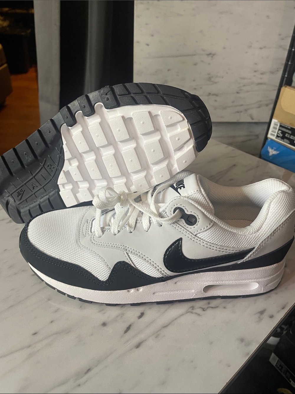 Nike White Low-Top Kids Sneakers with Black Swoosh